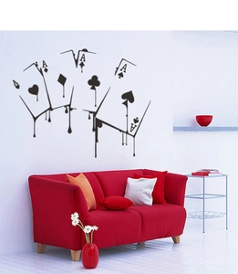 Melting poker cards wall decal featuring four aces on a minimalist living room wall