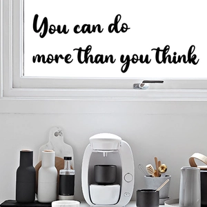 Inspirational 'You can do more than you think' wall sticker in black cursive font on glass