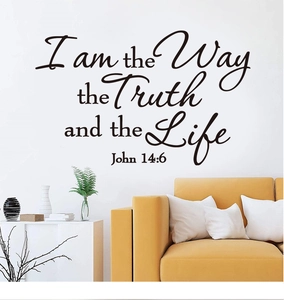 Detail of John 14:6 Bible verse wall decal on a living room wall above a yellow sofa