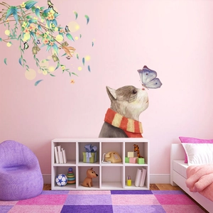 Cartoon wall decal with a cat, butterfly, and green floral vines for kids room