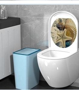 Stickers autocollants d'étoiles de mer et coquillages sur l'intérieur du couvercle de WC