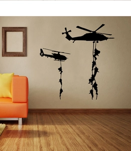 Detail view of black helicopter and soldier silhouette wall stickers for modern room decor