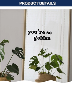 Detail of 'you're so golden' black vinyl wall sticker on a minimalist mirror surface