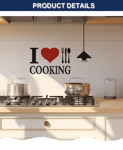 Detail of DIY kitchen wall sticker featuring black cooking text and red heart on white tiles
