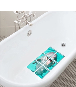 Detail of 3D non-slip bathtub stickers with blue dolphin patterns in a 6-piece set