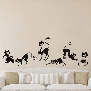 Set of 6 cute black cat wall stickers in various playful poses for home wall decoration