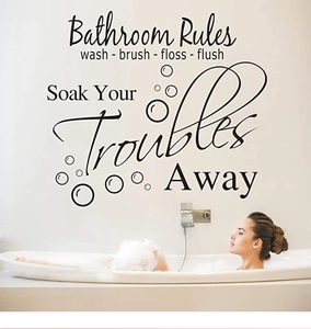 Detail of Bathroom Rules wall decals featuring Soak Your Troubles Away typography art