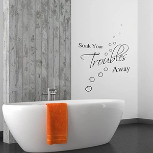 Detail of Bathroom Rules wall decal featuring Soak Your Troubles Away phrase and bubbles