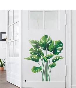 Detail of tropical monstera leaf wall stickers with realistic green palm plant textures