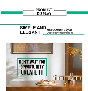 Detail of inspirational phrase wall sticker on real wooden table scene for home decor