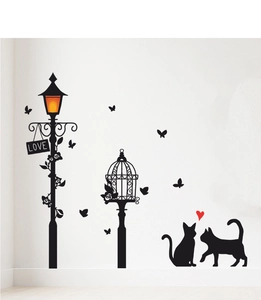 Detail of black cat silhouette wall stickers featuring vintage street lamp and LOVE sign