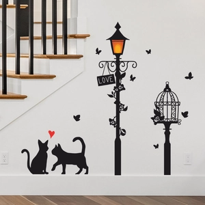Black silhouette wall sticker featuring cats, street lamp, and love heart decor