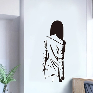 Minimalist black vinyl wall decal featuring an elegant woman silhouette art for living room