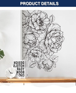 Close-up of black and white peony flower wall decals on a minimalist white living room wall