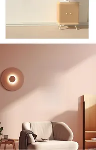 Detail of inspirational Smile vinyl wall decal quote in a warm modern living room setup