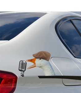 Funny white duck sticker with vintage microphone on a silver car fuel tank cap