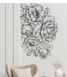 Detail view of monochrome peony wall decals in a modern living room setting