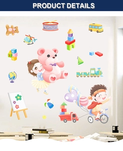 Detail view of cartoon kids wall stickers featuring school bus, train, and toys for nursery décor