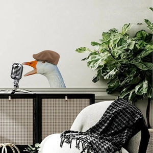 Funny cartoon white goose with brown cap singing into a vintage microphone wall sticker