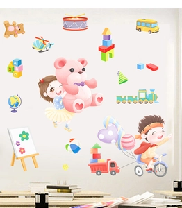 Detail of colorful self-adhesive wall stickers with cartoon kids and transport elements