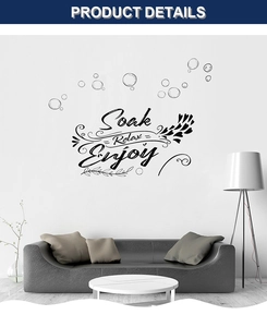 Detail of Soak Relax Enjoy wall decal with bubble patterns in a modern living room