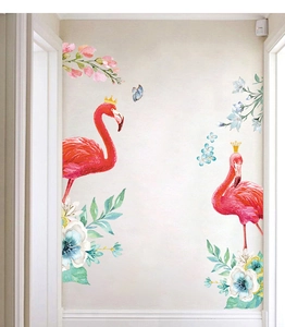 Detail of watercolor flamingo wall stickers with floral elements for nursery room decor
