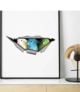 Detailed view of 3D cracked wall decal featuring three colorful parrots in a white frame