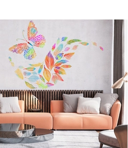 Detailed wall sticker decor showing colorful butterflies and feathers over a sofa