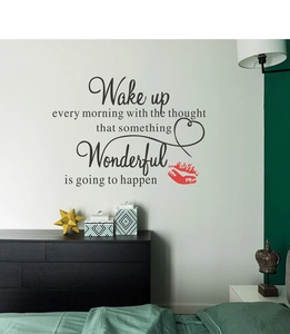 Detail of Wake Up Wonderful inspirational wall decal with heart and red lip on white wall