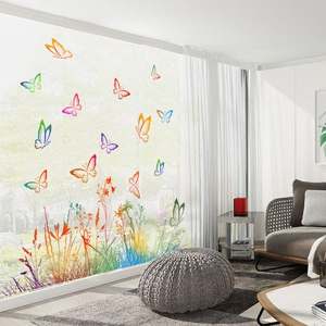 Colorful butterfly and floral wall stickers for home decor on a glass window