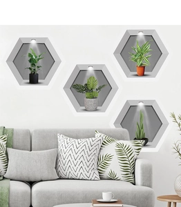 Detail of 4-piece 3D wall stickers featuring green potted plants in hexagonal niches