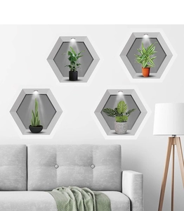 Detail showing four hexagonal 3D wall stickers with realistic green plants and spotlight effect