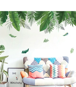 Detail of tropical monstera leaf wall stickers in green and grey for living room decor
