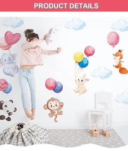 Detail of cute cartoon elephant and fox wall stickers with colorful balloons in kids room