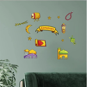 Detail showing Ramadan wall stickers set with mosques, moons, and stars on a green wall