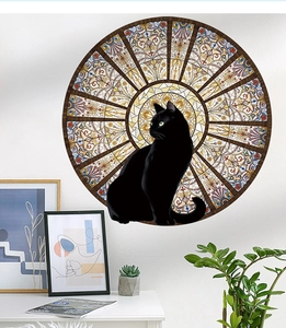 Artistic round black cat wall sticker with stained glass mandala patterns on a white wall