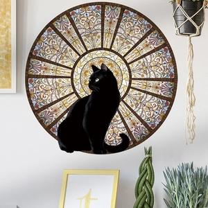 Round black cat wall sticker with colorful stained glass pattern in a modern living room