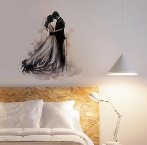 Romantic watercolor couple silhouette wall sticker displayed above a bedroom headboard