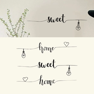 Sticker mural Home Sweet Home avec motifs ampoule et cœur pour déco de salon