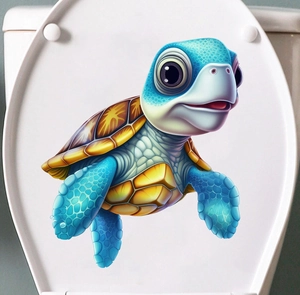 Detail of 3D cartoon sea turtle decal applied to a white bathroom toilet lid surface