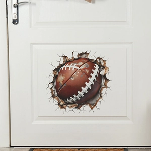 Macro detail of 3D cracked wall effect American football wall sticker on a white door