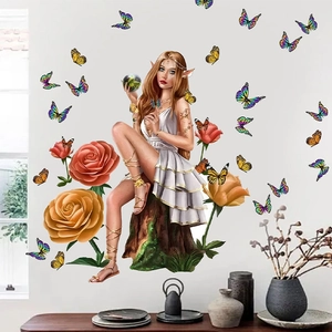 Detail view of fantasy elf girl wall sticker with roses and butterflies on a living room wall