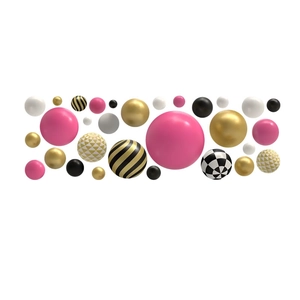 Colorful decorative wall spheres with stripes and checkerboard patterns for home decor