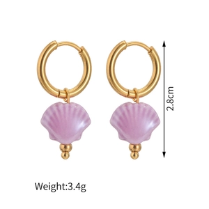 Detailed view of 18K gold plated stainless steel earrings with purple shell pendant