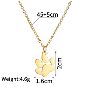 Detailed view of golden stainless steel paw print pendant with exact size specifications