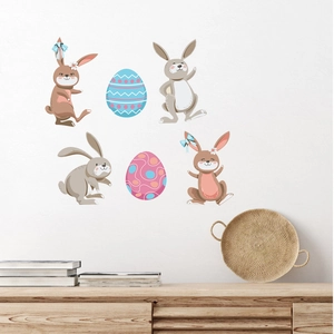 Detailed view of Easter rabbit and egg wall stickers on a white wall in a cozy room
