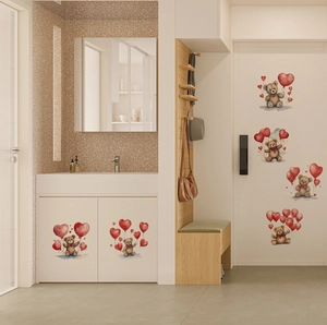 Detail of cute watercolor bear wall stickers with red heart balloons on white cabinet doors