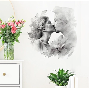 Romantic wall sticker showing couple kissing in black ink style for home decor