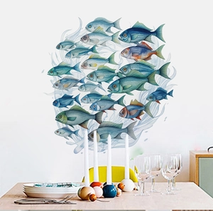 Macro detail of nautical fish school wall stickers featuring watercolor blue sea life