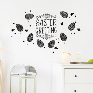 Close-up of Easter Greeting wall decals featuring black silhouette eggs and stars